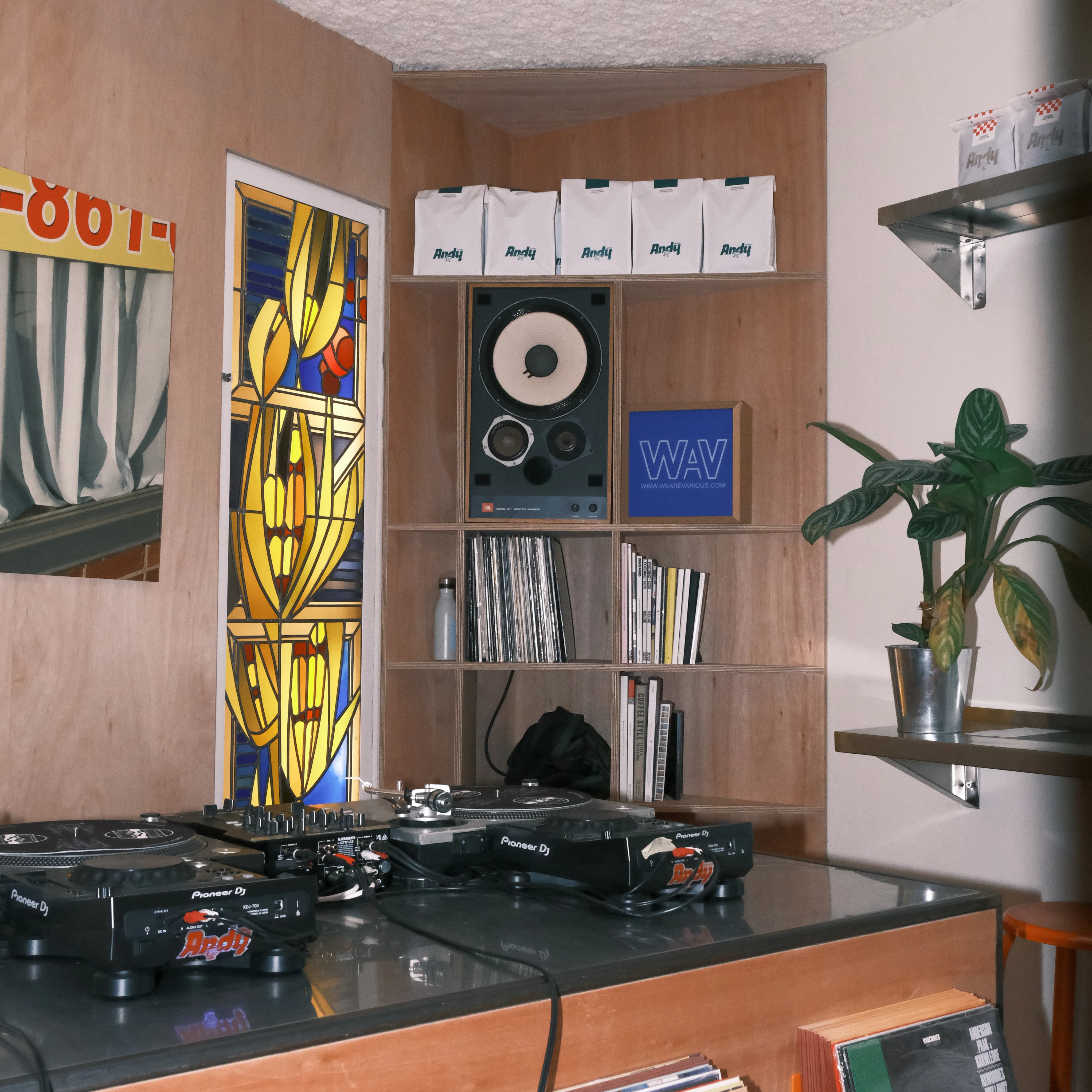 Record sleeves and a turntable set up for Andy's Morning Show at the roastery